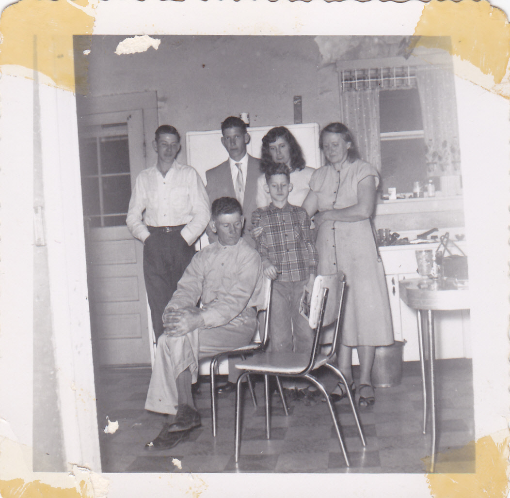 Hazel with three children and a dog