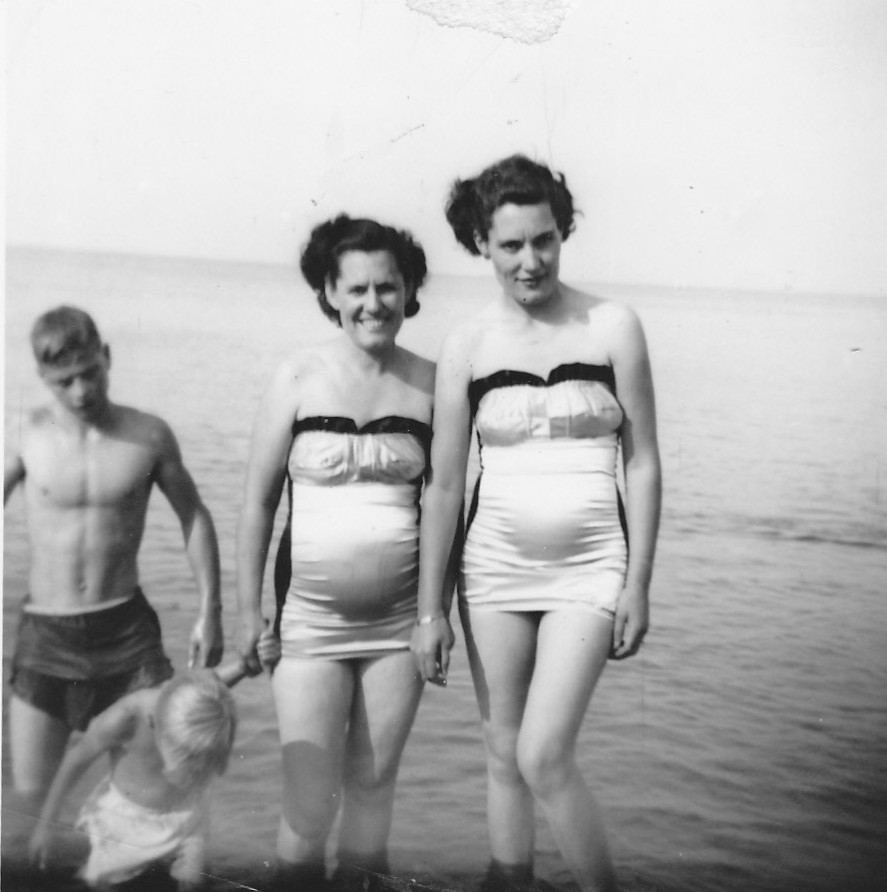 Jimmy Doan, Mae Harris, Mary Doan, and young child at the lake