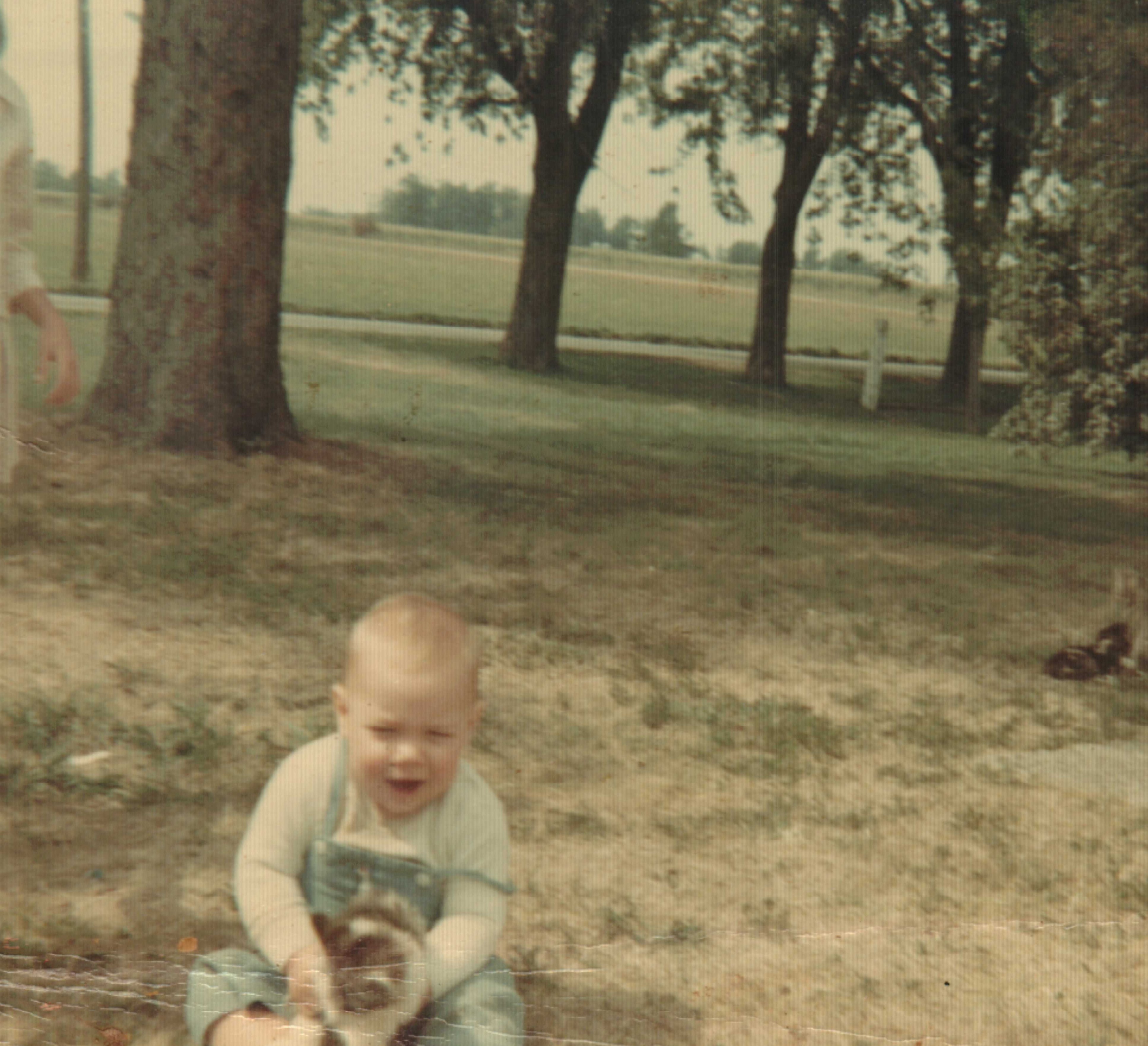Nathan Eugene Rogers with a kitten