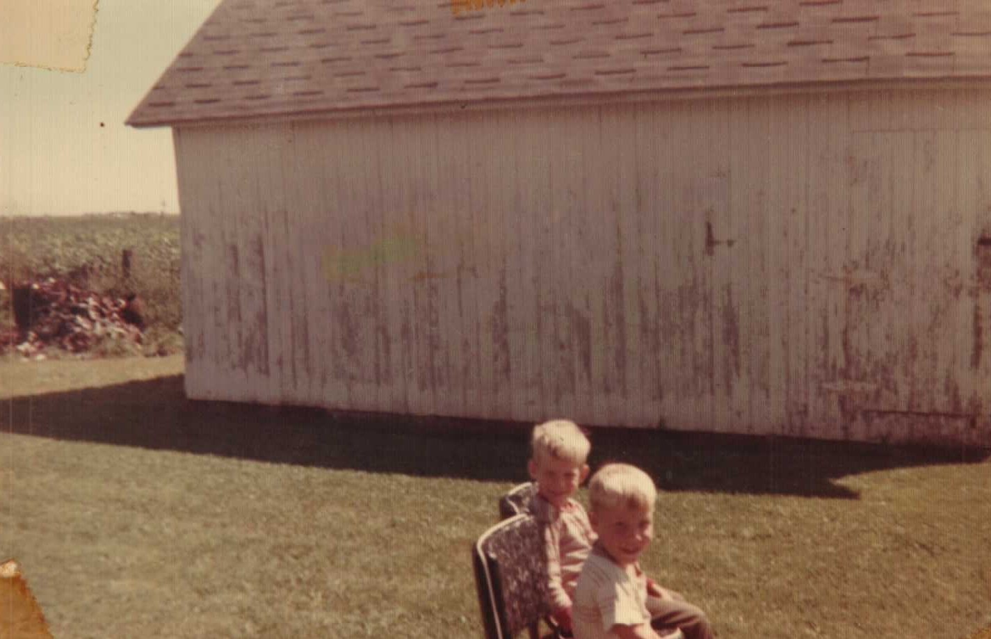 Ishmael and Nathan sitting outside