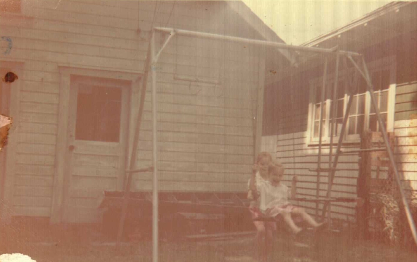 Mischelle and Rebecca Rogers swinging